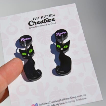 Black Cat Earrings. Black Gloss acrylic, etched and paint-filled combined with a etched and paint-filled black topper featuring the word "meow"