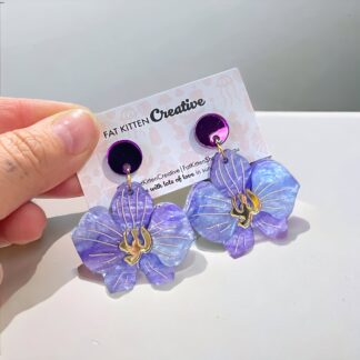 Orchid Dangle blue. Light blue sparkle acrylic paired with a stunning gold mirror acrylic and a purple mirror acrylic topper.