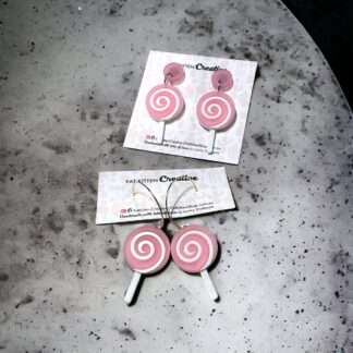 Lollipop earring. Pink frosted acrylic combined with a white marble acrylic.